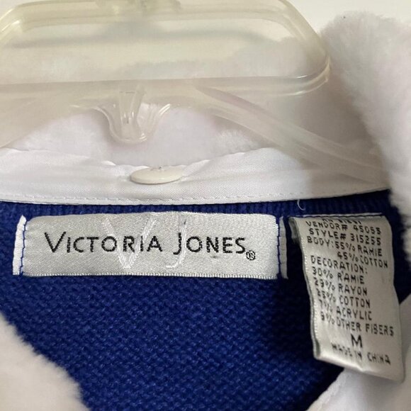 This blue snowmen sweater is so cute on. It is a size medium. - Picture 3 of 3